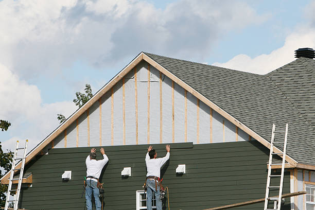 Professional Siding technician working in Hudgins, VA